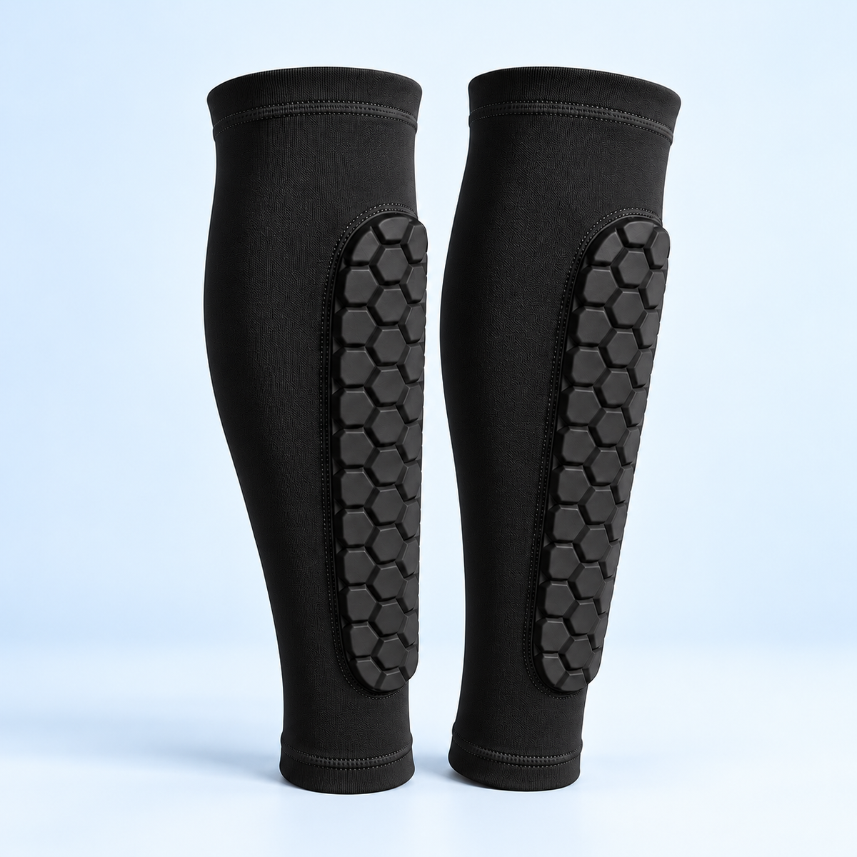Pair of black ShinBuddy cushioned ski sleeves
